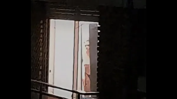 ใหม่ Spying on a busty neighbor through the window หนังเย็น